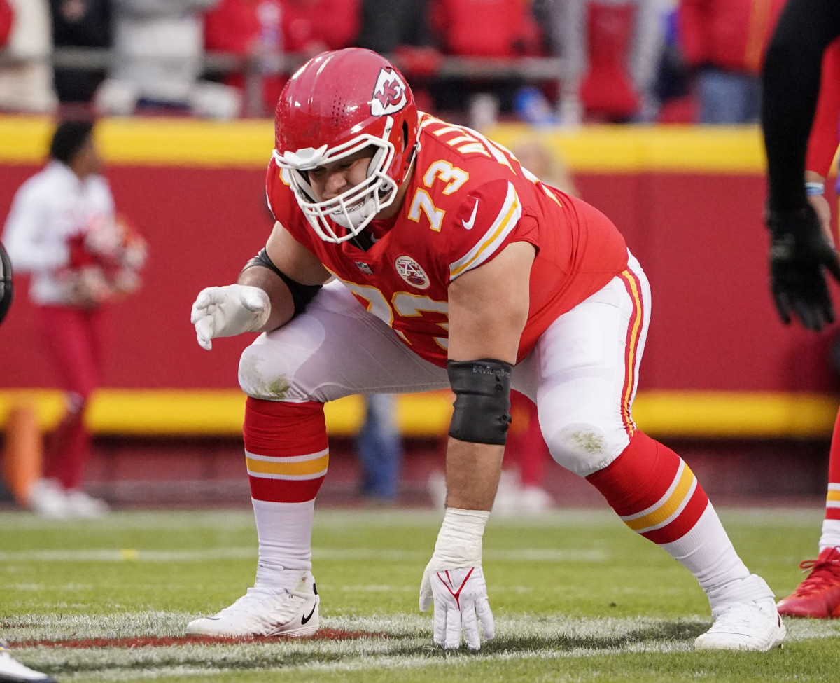 Nick Allegretti bends over preparing for the snap